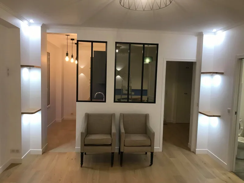Séjour terminé — verrière d'atelier et parquet